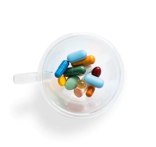 A cup filled with antidepressant pills